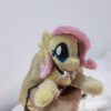 6" long (from hoof to hoof) FS plushie with a dress