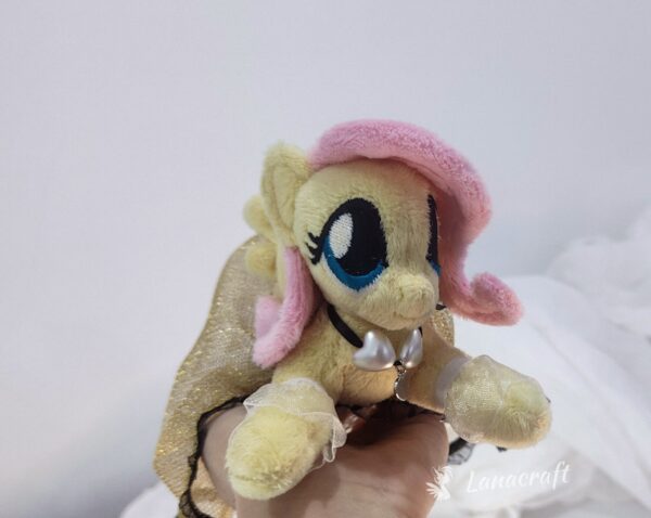 6" long (from hoof to hoof) FS plushie with a dress