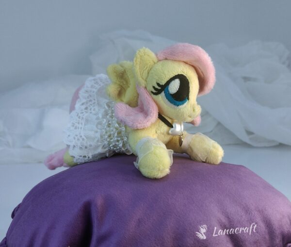 6" long (from hoof to hoof) FS plushie with a dress