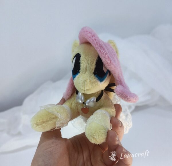 6" long (from hoof to hoof) FS plushie with a dress