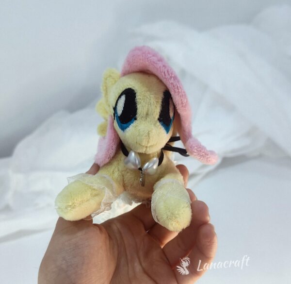 6" long (from hoof to hoof) FS plushie with a dress