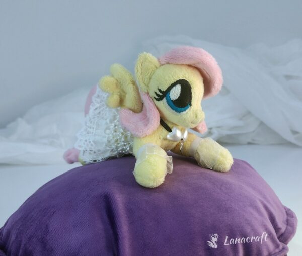 6" long (from hoof to hoof) FS plushie with a dress