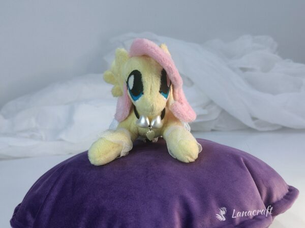 6" long (from hoof to hoof) FS plushie with a dress