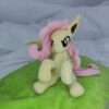 7" long sitting Flutterbat plushie with mane and tail of Minky fabric and BIG apple and carrot
