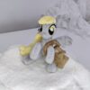 011 7" long sitting Derpy plushie with mane and tail of Minky fabric and a postman's bag