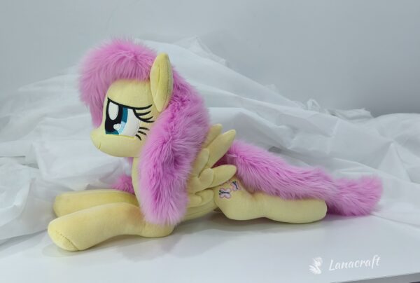 23" long (from hoof to hoof) Fluttershy plushie
