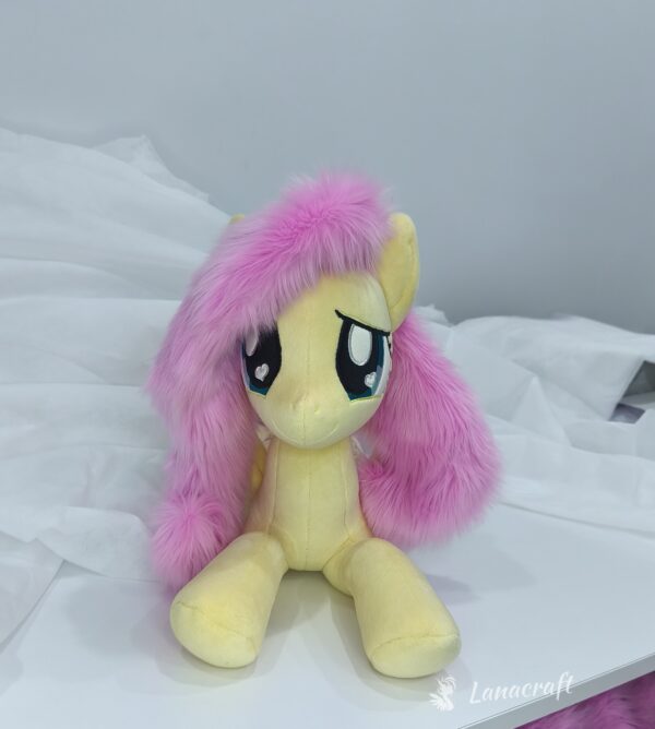 23" long (from hoof to hoof) Fluttershy plushie