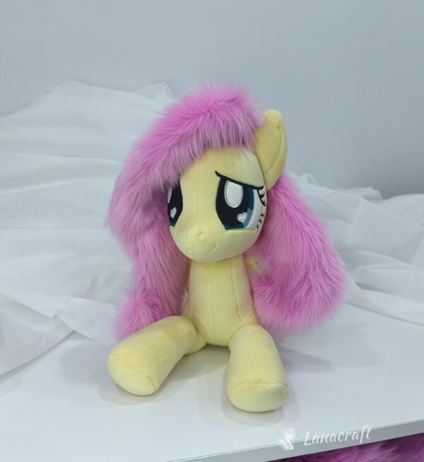 23" long (from hoof to hoof) Fluttershy plushie