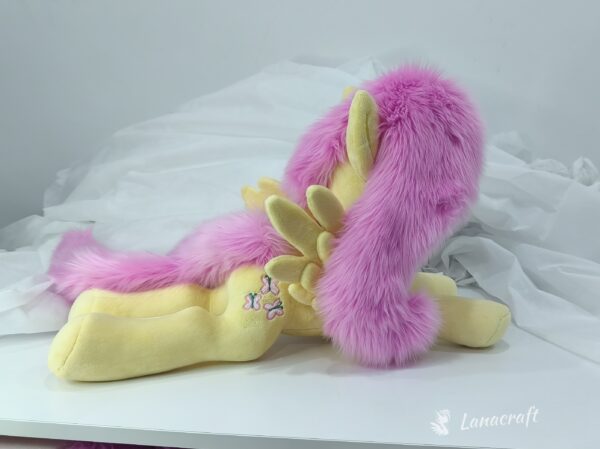 23" long (from hoof to hoof) Fluttershy plushie