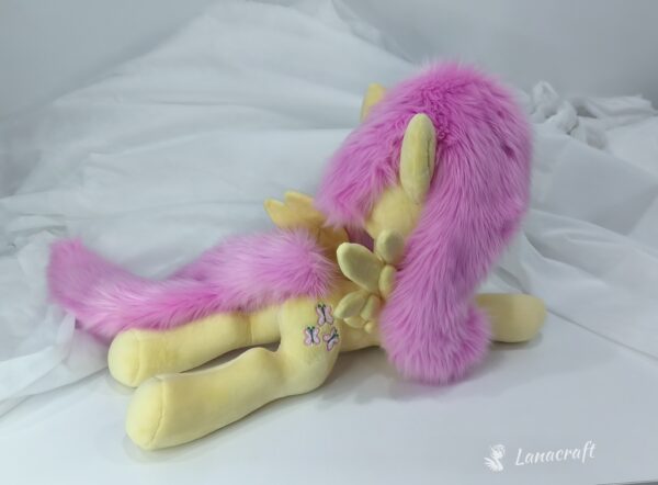 23" long (from hoof to hoof) Fluttershy plushie