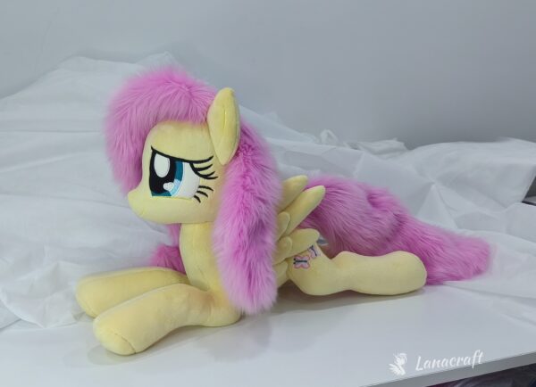 23" long (from hoof to hoof) Fluttershy plushie