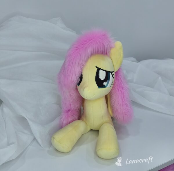 23" long (from hoof to hoof) Fluttershy plushie
