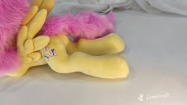 23" long (from hoof to hoof) Fluttershy plushie