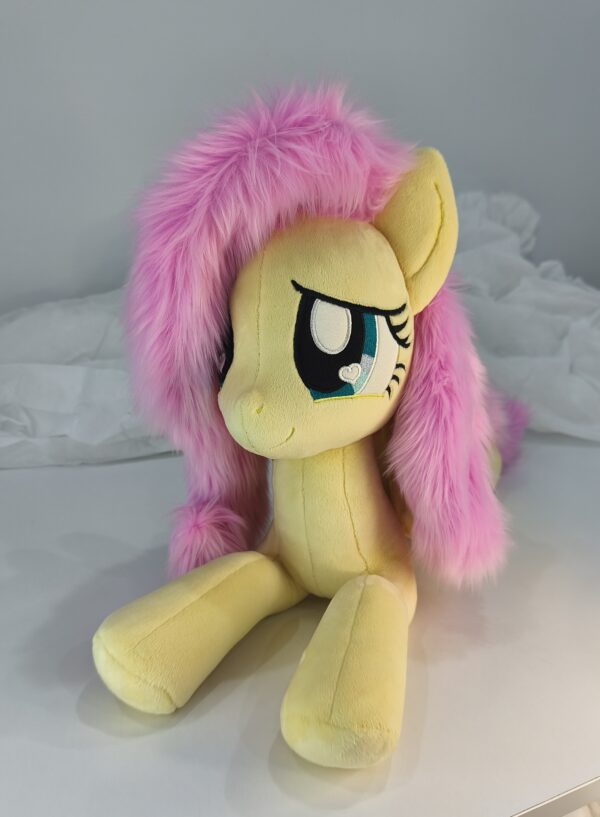 23" long (from hoof to hoof) Fluttershy plushie
