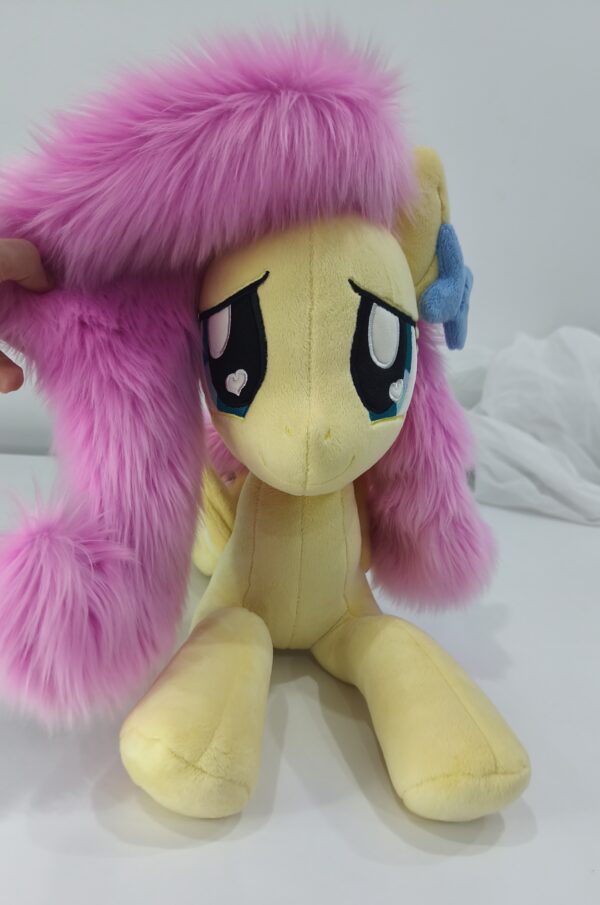 23" long (from hoof to hoof) Fluttershy plushie